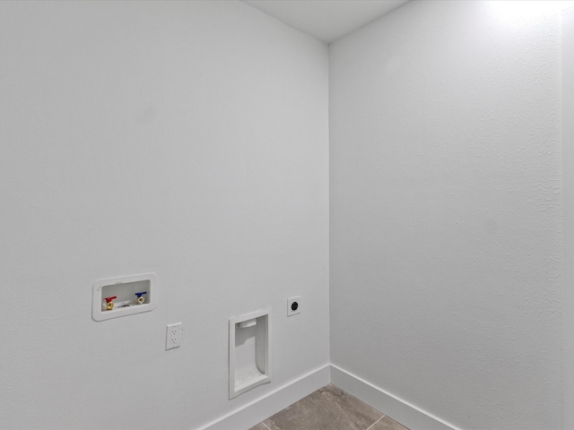 laundry room with washer hookup, light tile patterned flooring, and hookup for an electric dryer