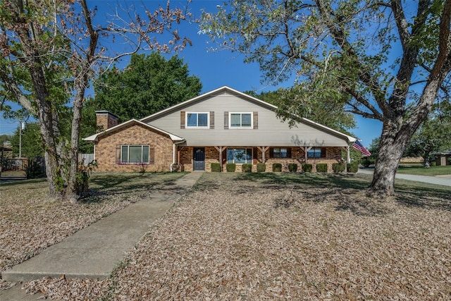 view of front of house featuring a front lawn