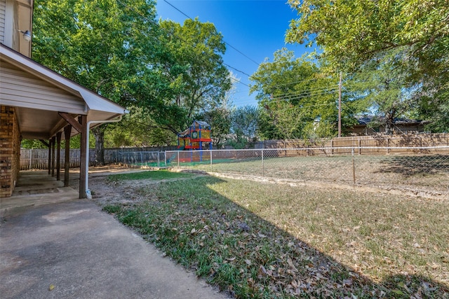 view of yard featuring a playground