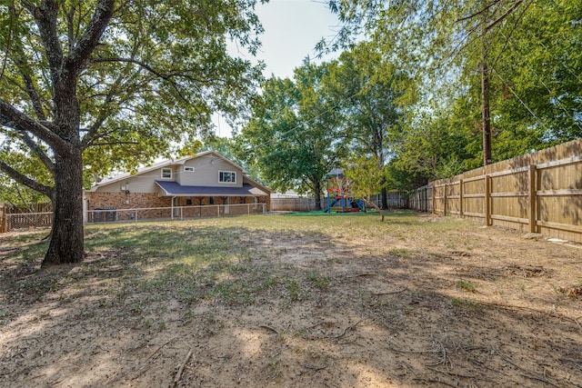 view of yard featuring a playground