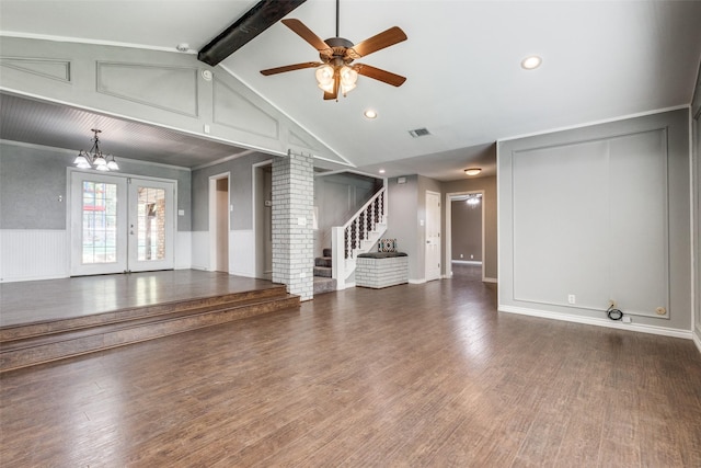 unfurnished living room with french doors, crown molding, lofted ceiling with beams, dark hardwood / wood-style floors, and ceiling fan with notable chandelier