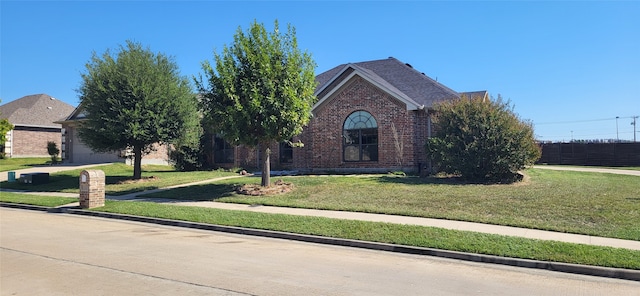 view of front of home with a front yard