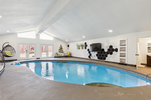 view of pool featuring french doors