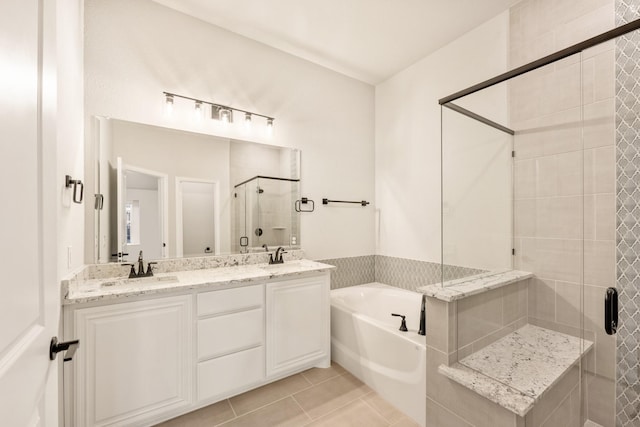 bathroom featuring vanity, tile patterned floors, and independent shower and bath