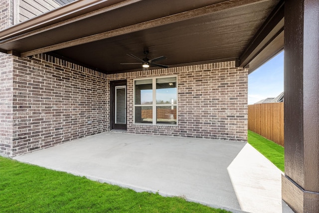 view of patio featuring ceiling fan