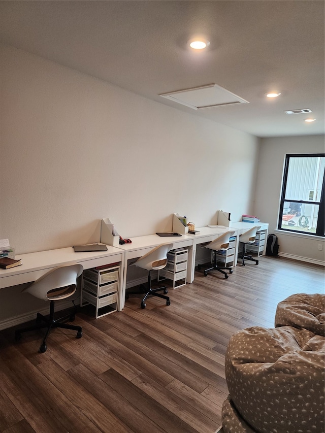 office space featuring dark wood-type flooring