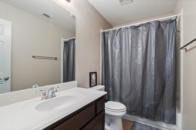 full bathroom featuring vanity, toilet, tile patterned floors, and shower / bath combination with curtain