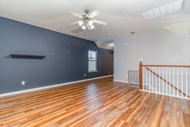 spare room with light hardwood / wood-style floors and ceiling fan