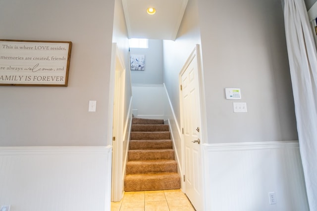 stairs with tile patterned flooring