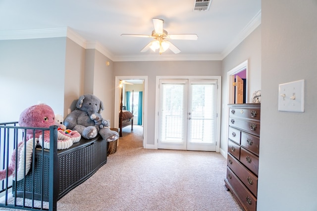 interior space with light carpet, ornamental molding, and ceiling fan