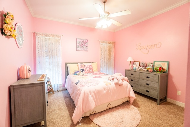 carpeted bedroom with crown molding and ceiling fan