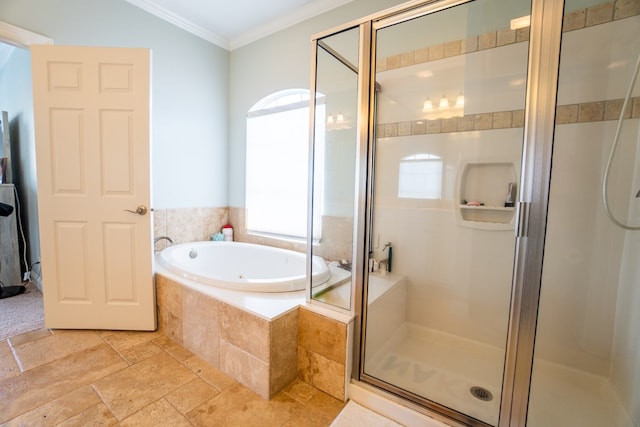 bathroom featuring ornamental molding, independent shower and bath, and a healthy amount of sunlight