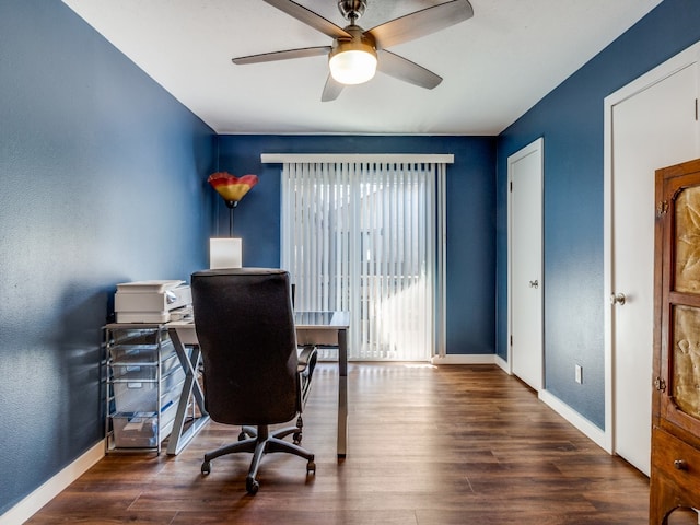 office area featuring ceiling fan and dark hardwood / wood-style flooring