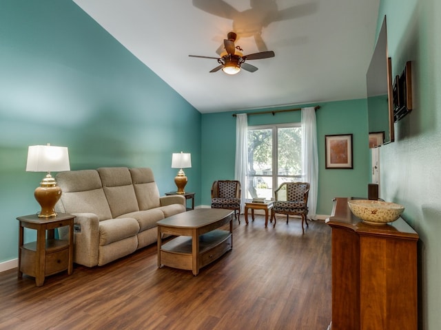 living room featuring lofted ceiling, ceiling fan, and dark hardwood / wood-style flooring