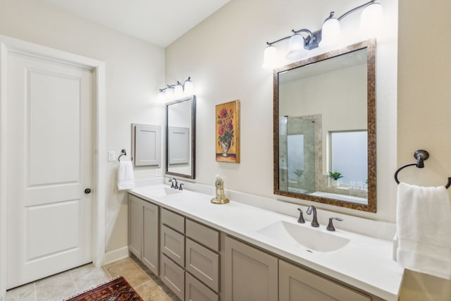 bathroom featuring tile patterned floors, an enclosed shower, and vanity