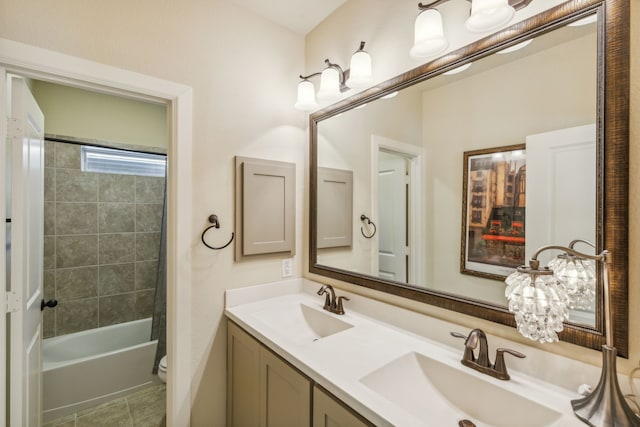 full bathroom featuring shower / tub combo, vanity, toilet, and tile patterned floors