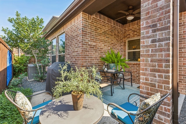 view of patio with central AC and ceiling fan