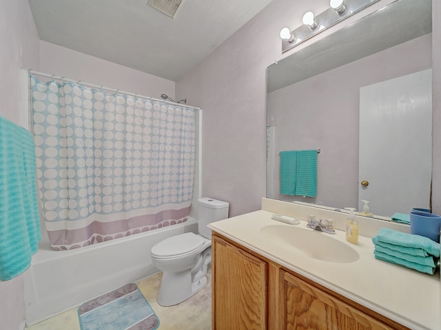 full bathroom featuring shower / bath combination with curtain, vanity, toilet, and tile patterned floors