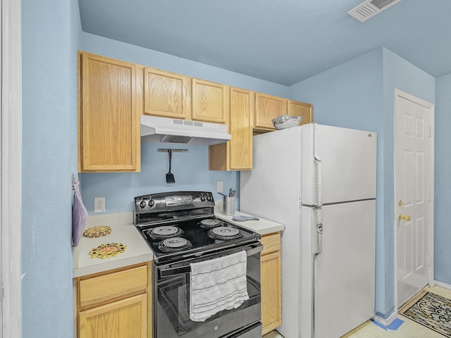 kitchen with white fridge, light brown cabinets, and black electric range