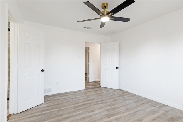 unfurnished bedroom featuring ceiling fan and light hardwood / wood-style floors