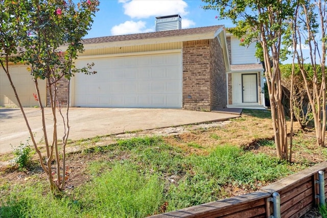 exterior space featuring a garage