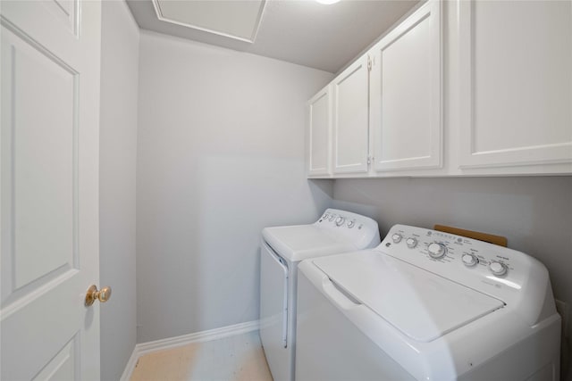 laundry area featuring cabinets and independent washer and dryer