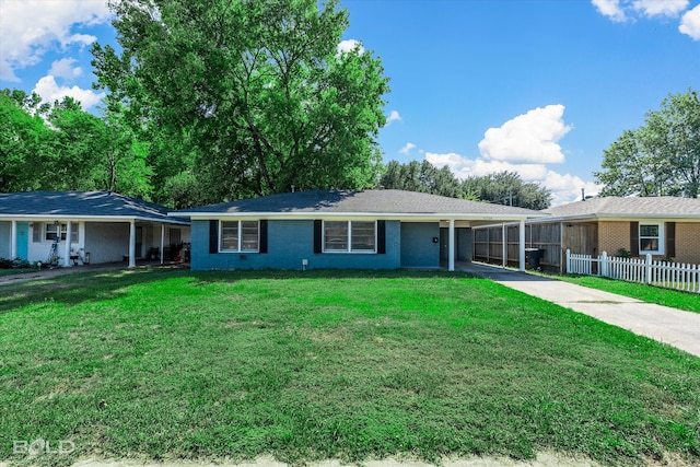 ranch-style house featuring a front lawn