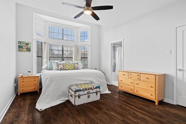 bedroom with dark hardwood / wood-style floors and ceiling fan