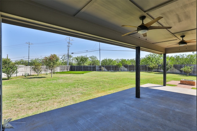 view of patio featuring ceiling fan