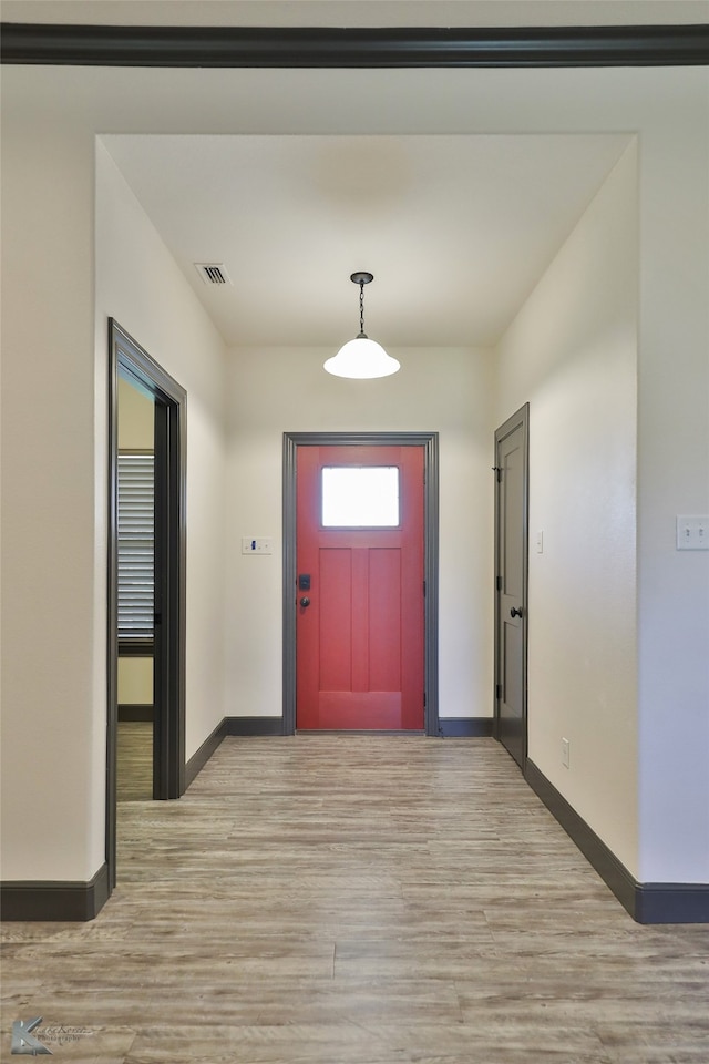 foyer featuring light hardwood / wood-style flooring