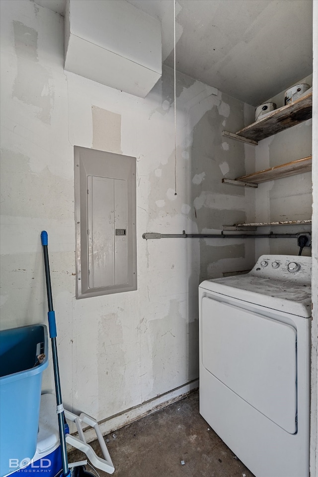 laundry room featuring washer / clothes dryer and electric panel