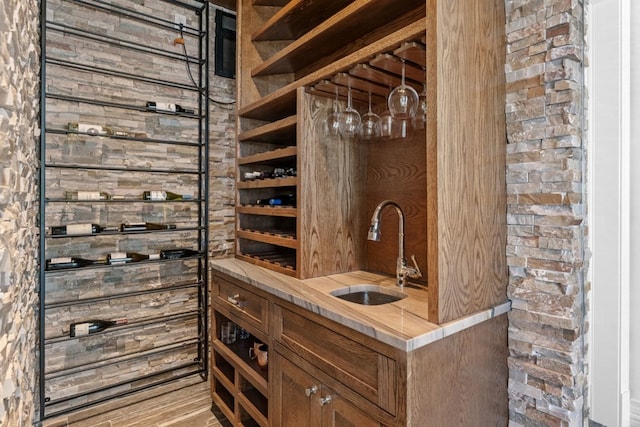 wine cellar featuring wet bar