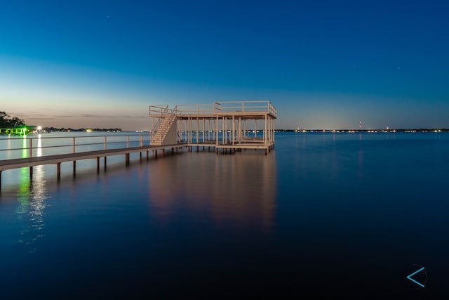 dock area with a water view