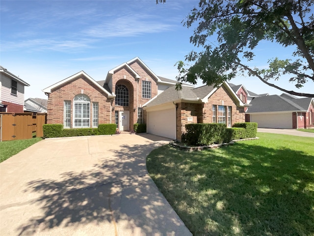 front facade featuring a garage and a front lawn