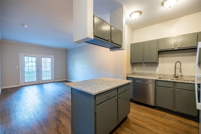 kitchen with ornamental molding, sink, a kitchen island, dishwasher, and dark hardwood / wood-style floors