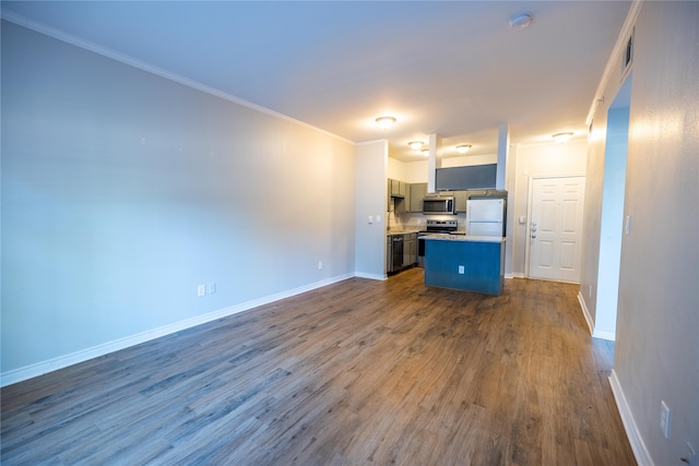 unfurnished living room featuring ornamental molding and dark hardwood / wood-style flooring