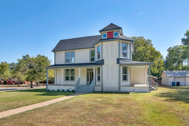 victorian-style house with covered porch and a front yard