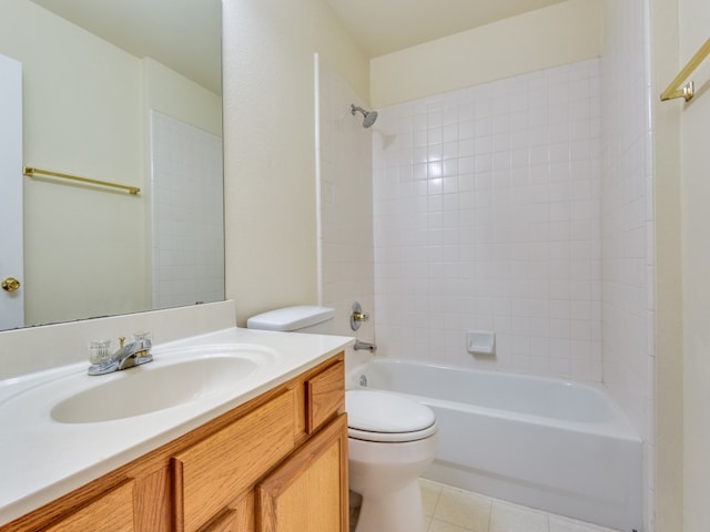 full bathroom with vanity, toilet, tile patterned floors, and tiled shower / bath