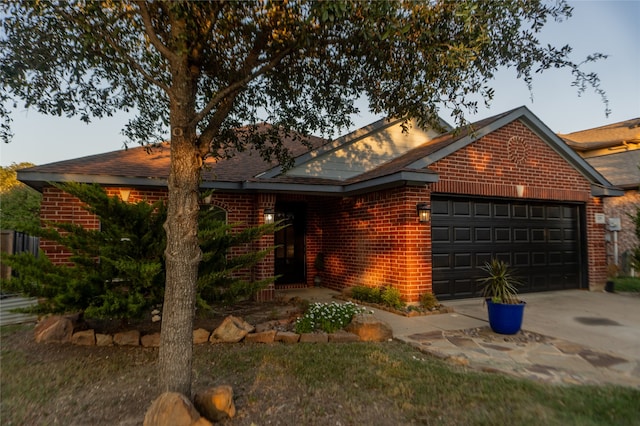 single story home with a garage