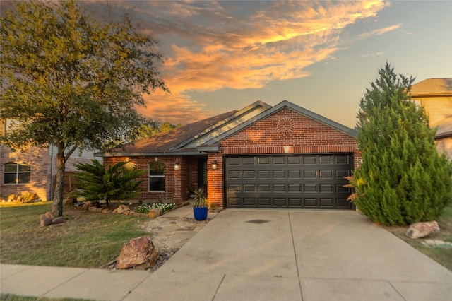 view of front of property with a garage