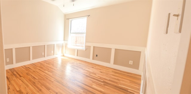 unfurnished room with hardwood / wood-style floors