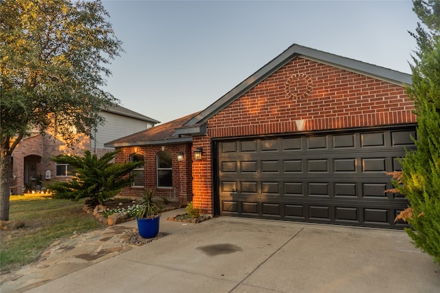 view of front of home with a garage