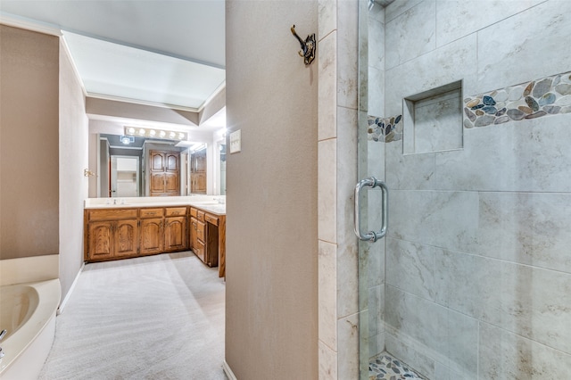 bathroom with vanity, an enclosed shower, and ornamental molding