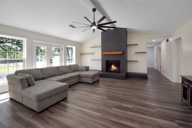 living room featuring ceiling fan, beam ceiling, a brick fireplace, high vaulted ceiling, and dark hardwood / wood-style floors