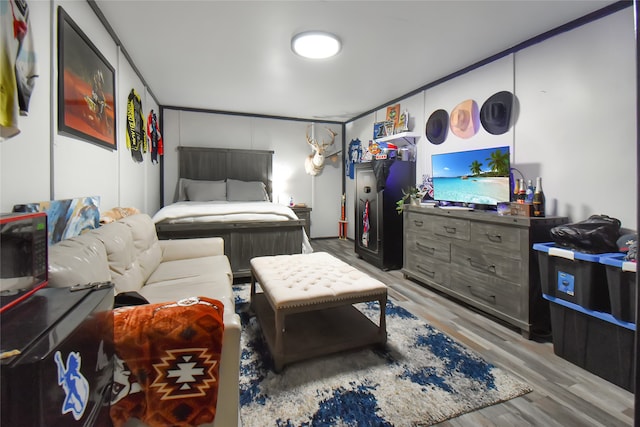 bedroom with light wood-type flooring