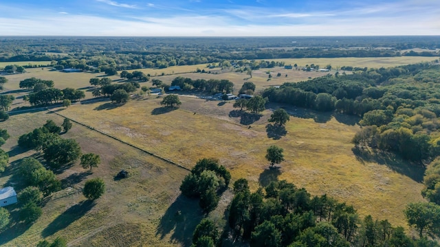 birds eye view of property featuring a rural view