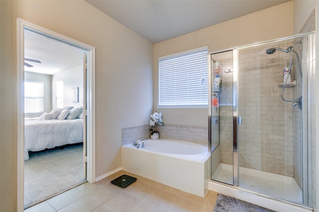 bathroom featuring tile patterned floors, ceiling fan, and independent shower and bath