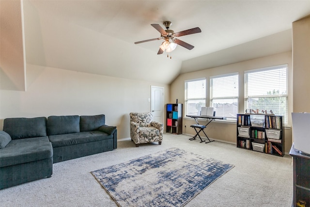 carpeted living room with vaulted ceiling and ceiling fan