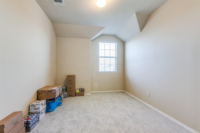 bonus room featuring carpet flooring and vaulted ceiling