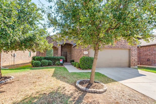 obstructed view of property with a front lawn